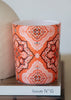 Orange patterned luxury home fragrance candle from the Arabesque Mosaic Collection by Muriḥ